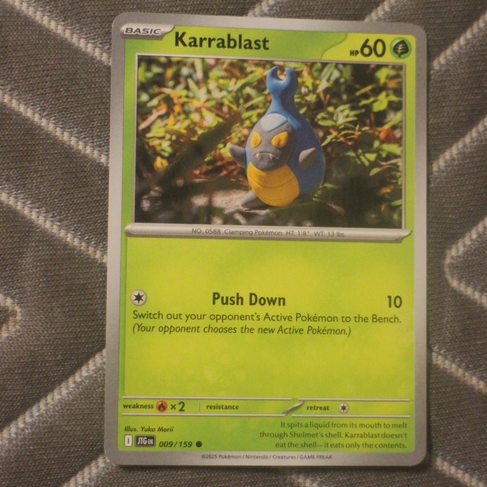 Pokemon Card - Karrablast with Green and Blue Design